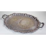 Large silver plated tray, the shell and C scroll border with further scrolls to the handles, leaf