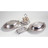 Silver plated wares, to include two entree dishes, a toast rack and a egg cup stand