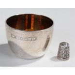 Silver beaker and thimble