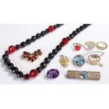 Mixed costume jewellery, to include rings, pendants, a necklace and brooches, (qty)