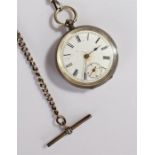 A silver pocket watch and chain