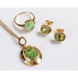 Peridot set pendant on chain, mounted in unmarked yellow metal, together with a pair of earrings and