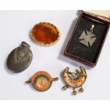 Selection of costume jewellery to include; a silver fob pendant, a 20th Century glass intaglio