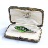 Silver and enamel brooch, in the form of a leaf, cased