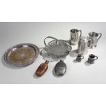 Collection of pewter objects to include three tankards, one lidded, a hip flask and trays etc (qty)