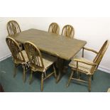 Single plank elm topped dining table and six wheel back chairs