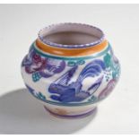 Poole pottery vase decorated with a bird and flower motif (14cm high)