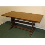 17th Century style oak trestle end table, the rectangular top above trestle supports