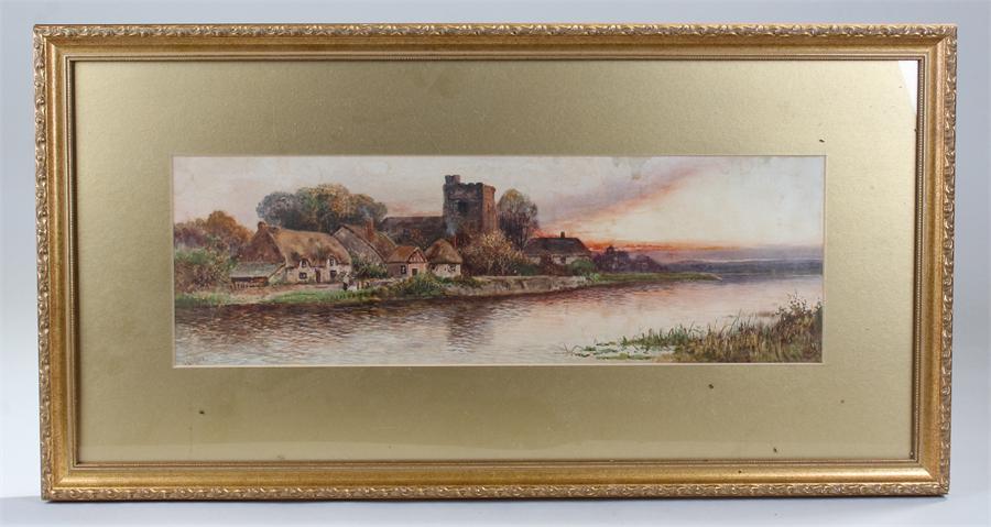 J Clifford , watercolour of a village scene viewed across a river signed J Clifford. in a glazed