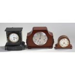 Three clocks, to include a Victorian black slate mantel clock Smith & Son, a oak cased clock and a
