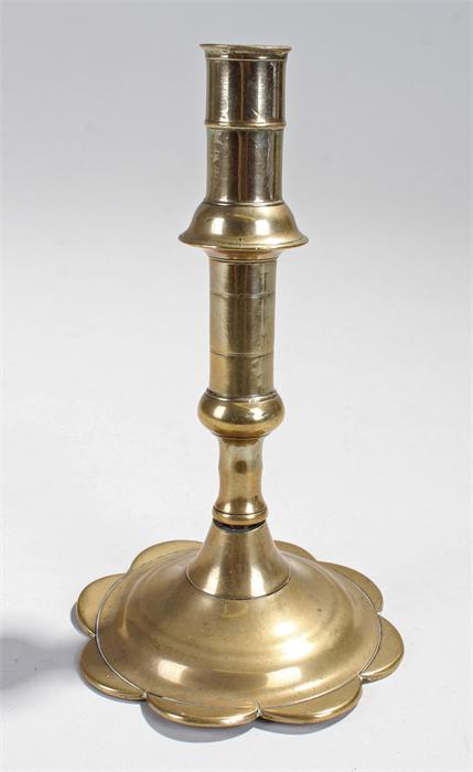 18th Century brass ejector candlestick with petal foot.