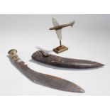 Model of a spitfire on stand, together with a kukri, (2)