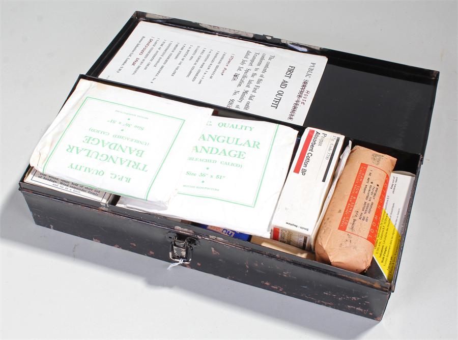 Tin box containing medical items.