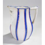 19th Century mask jug, in white and blue, 13cm high