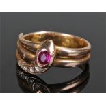 14 carat gold diamond and amethyst ring, the ring in the form of a snake with an amethyst head and a