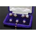 Star sapphire cufflink and button set, the star sapphires at approximetley 16.05 carats in gold
