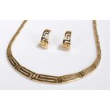 14 carat gold necklace and earring set, designed with elongated zig zags, total weight 20.7