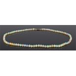 Opal necklace, with a row of opal spheres and a gold clasp end, 48cm long