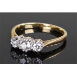 18 carat gold diamond ring, the ring set with three diamonds to the platinum head, ring size P