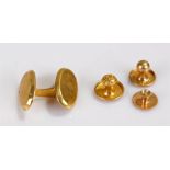18 carat gold, to include a single cuff-link and three buttons, total weight 5.4 grams