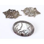 Art Nouveau style silver and mother of pearl brooch, with bull rush design, together with two