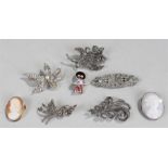 Brooches, to include two cameo brooches, a Golly badge, various other brooches, (qty)