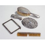 Silver backed hairbrush,comb, mirror af, and photograph frame (4)