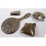 Silver hand held mirror, together with a silver cigarette holder and two British Empire purse, (4)