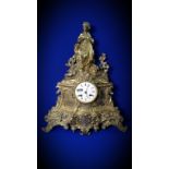 19TH CENTURY FRENCH GILT METAL MANTLE CLOCK MADE BY P MERLE OF PARIS