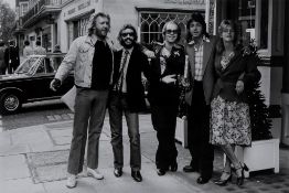 Terry O'Neill (b.1938) - Elton John Seeing Old Friends, London, 1976  Gelatin silver print,