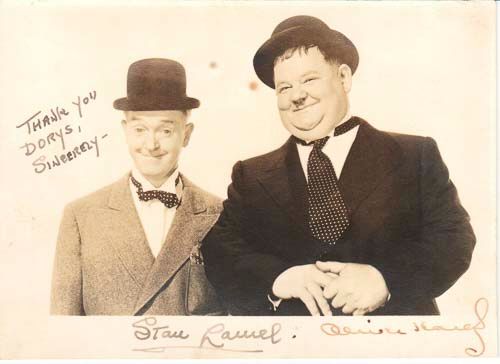 LAUREL, STAN  &  OLIVER HARDY - Vintage black and white, head and shoulders photograph of Stan...