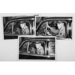 PRESLEY, ELVIS - Three black and white, unsigned snapshots of Elvis Presley wearing...  Three