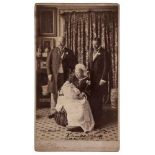 VICTORIA, QUEEN - 'THE FOUR GENERATIONS' - Albumen print photograph of a seated Queen Victoria