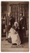 VICTORIA, QUEEN - 'THE FOUR GENERATIONS' - Albumen print photograph of a seated Queen Victoria