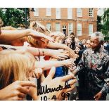 MANDELA, NELSON - Colour photograph of Nelson Mandela and Thabo Mbeki embracing  Colour photograph