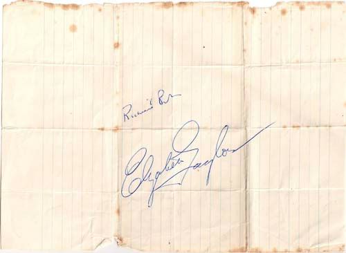 TAYLOR, ELIZABETH  &  RICHARD BURTON - Individual blue ink signatures by Elizabeth Taylor and