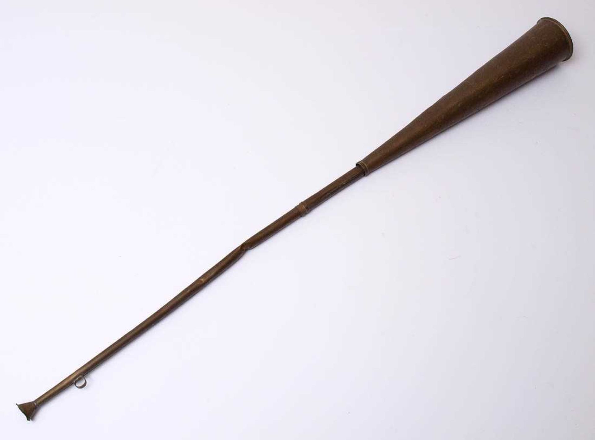 Posaune, wohl 19.Jhdt.Messing. L.119cm. Rohr an einer Stelle eingedällt.