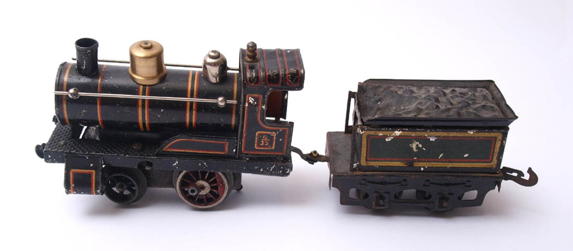 Dampflokomotive mit Tender, Bing, Spur 0 Blech, farbig lithographiert. Altersspuren, Feder