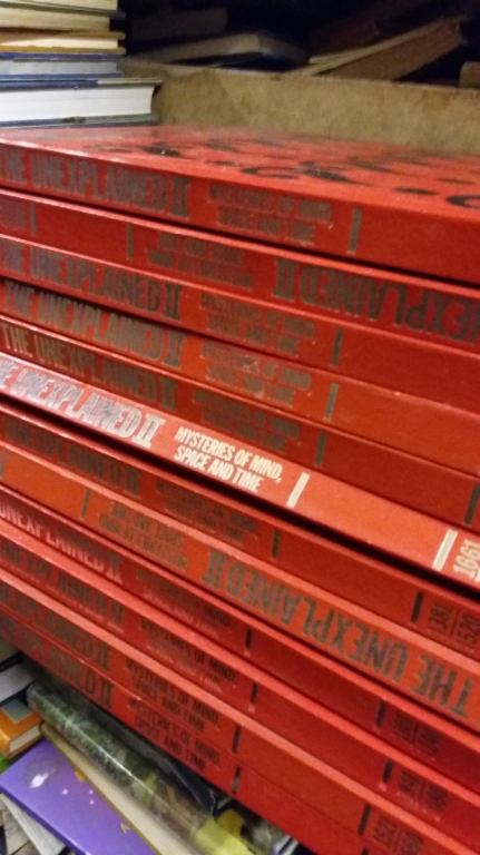 Books: 12 vols of red-bound "The Unexplained".