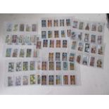 Selection of Cigarette Cards, including Wild Flowers, Badges, etc