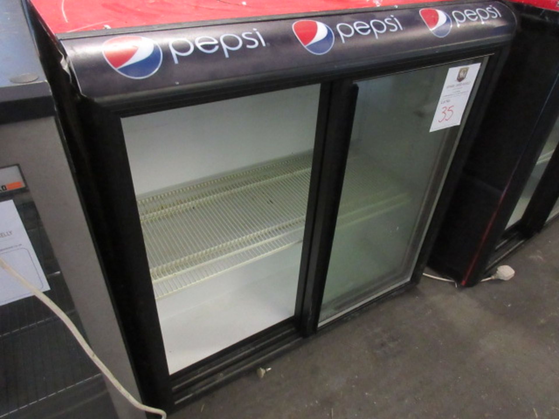 Frigoglass Ltd Norcool S66 Bottle Cooler. Double glass sliding doors, 240v, size 920 x 480 x 900mm h