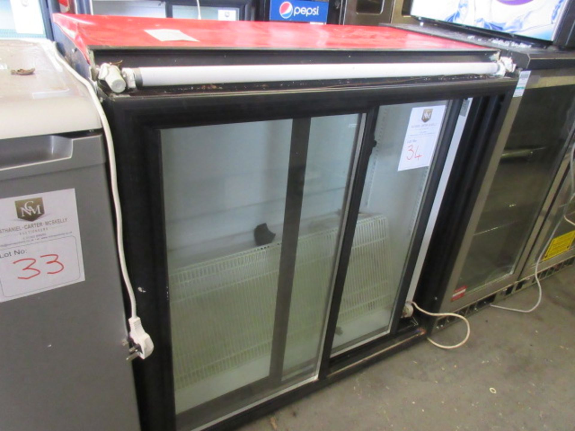 Frigoglass Ltd Norcool S66 Bottle Cooler. Double glass sliding doors, 240v, size 920 x 480 x 900mm h