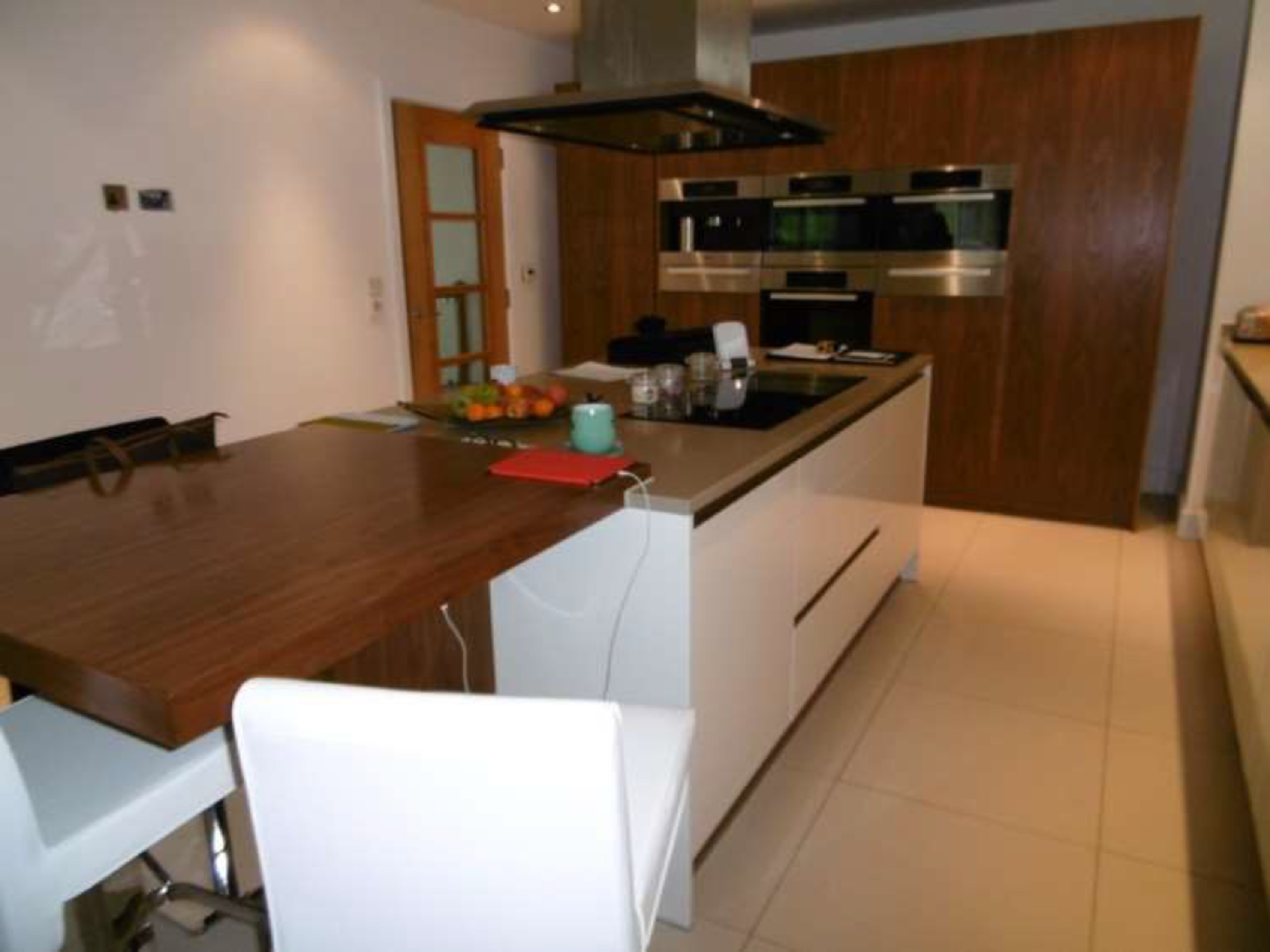 Luxury Contemporary High Glass Cream and Cherry Kitchen with Extensive range of Miele Appliances. - Image 2 of 5