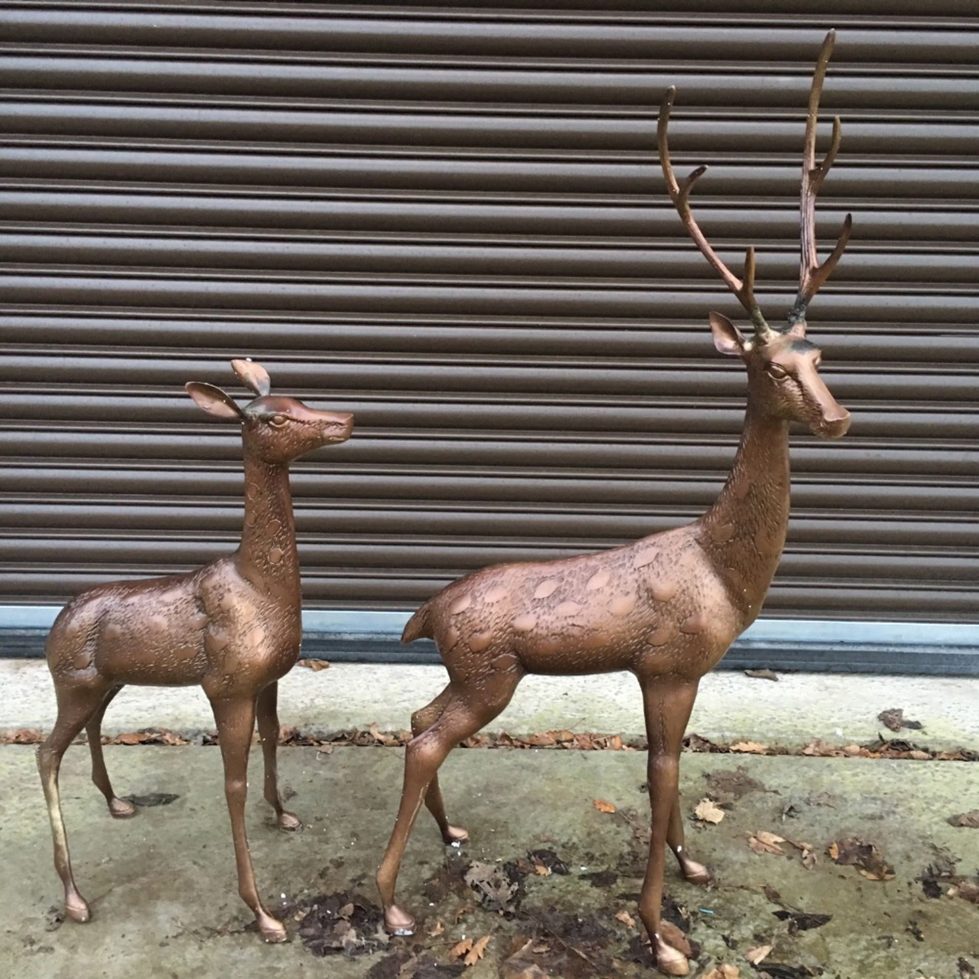 SET OF 2 CAST METAL DEERS IN BRONZE FINISH