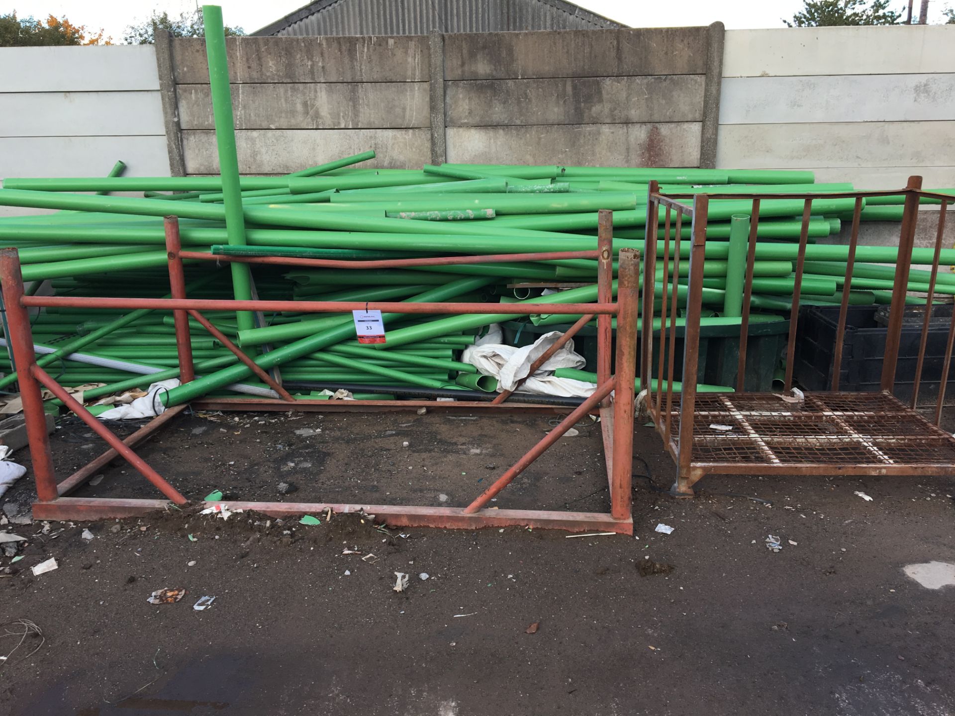 3 x metal stillages & quantity of green plastic piping