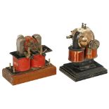 2 Early Electric Motors, c. 1910 Unmarked, large coils, belt pulleys, on wooden bases, heights 9 ½