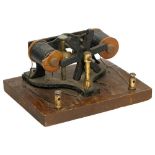 Small Electromagnetic Motor, c. 1900 For physical demonstrations, on wooden base, 5 x 4 in.