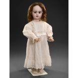 Bébé Jumeau Lioretgraphe Doll, c. 1895 With bisque head impressed "11", fixed brown paperweight