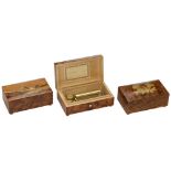 3 Swiss Reuge 3/72 Musical Boxes, c. 1980 In root wood-veneered cases, 2 of them with inlaid lids.