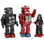 3 Japanese Toy Robots 1) Rotate-O-Matic Super Astronaut, copy, battery, defective. - 2) Horikawa